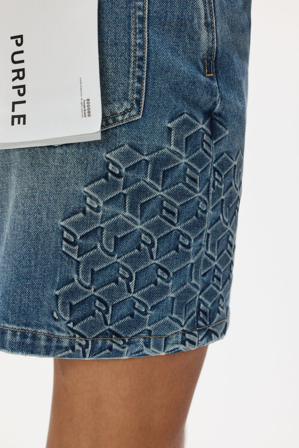 Embossed Monogram Mini Skirt