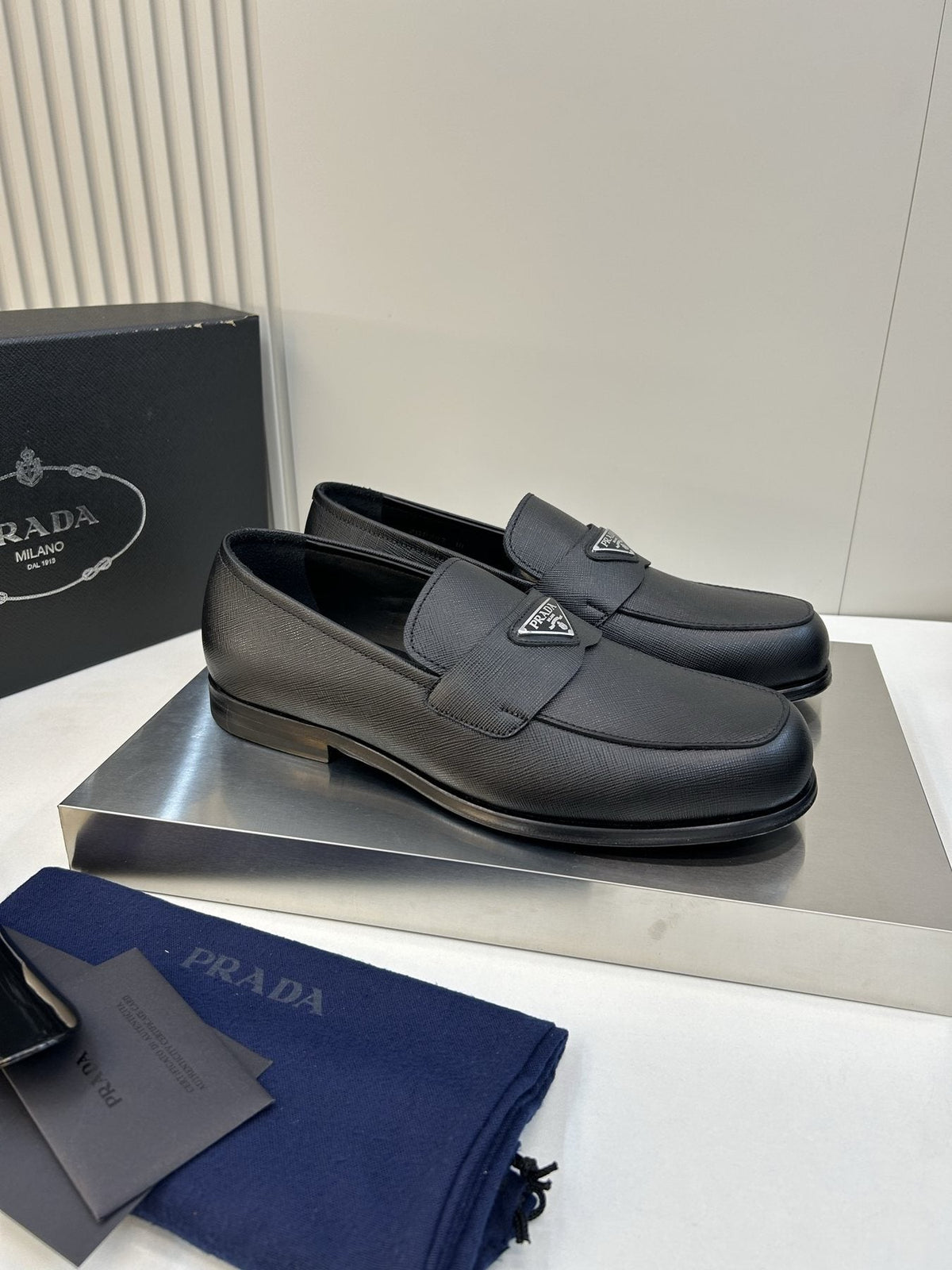 Prada Black Triangular Plaque Loafers